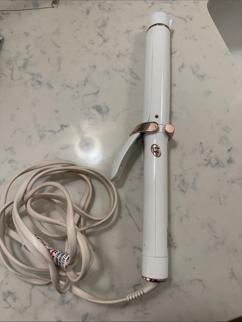 T3 Singlepass 1.25 inch ceramic curling iron in white and Rose Gold